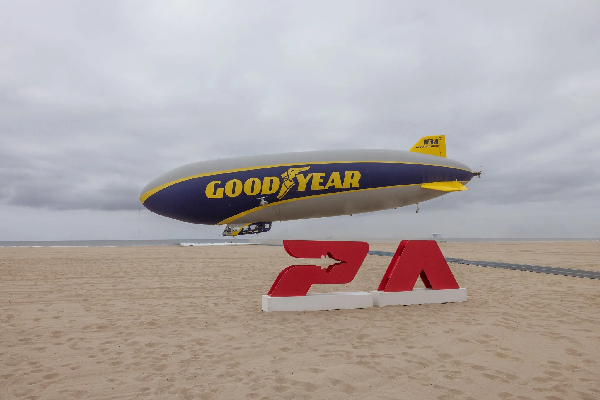 GOODYEAR BLIMP BEACH LANDING TO LAUNCH MILESTONE YEAR — Pacific